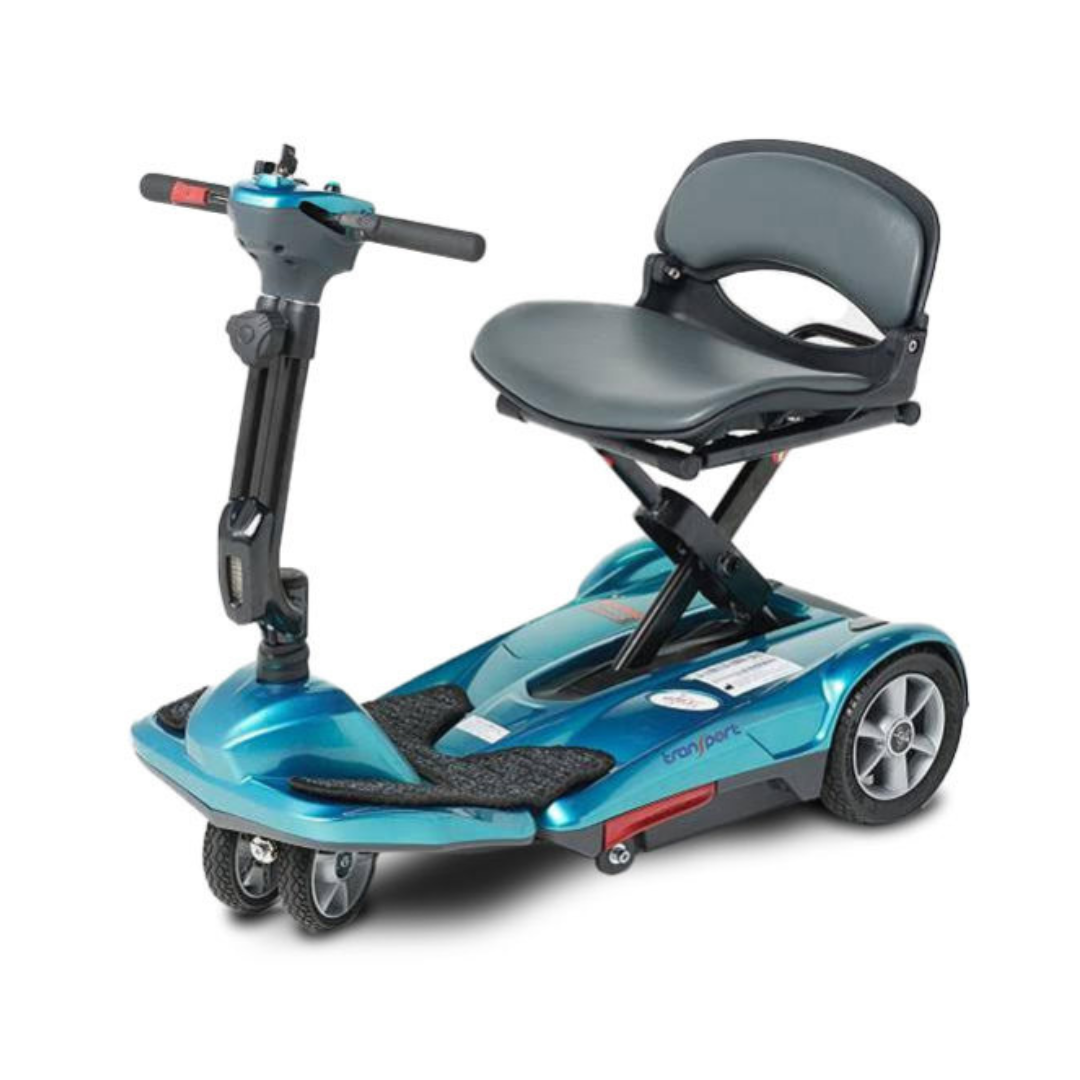 The EV Rider TranSport M Easy Move S19M Travel Scooter is a compact blue folding scooter with three small front wheels, two larger rear wheels, a padded seat with backrest, and handlebars, designed for lightweight travel, shown on a white background.
